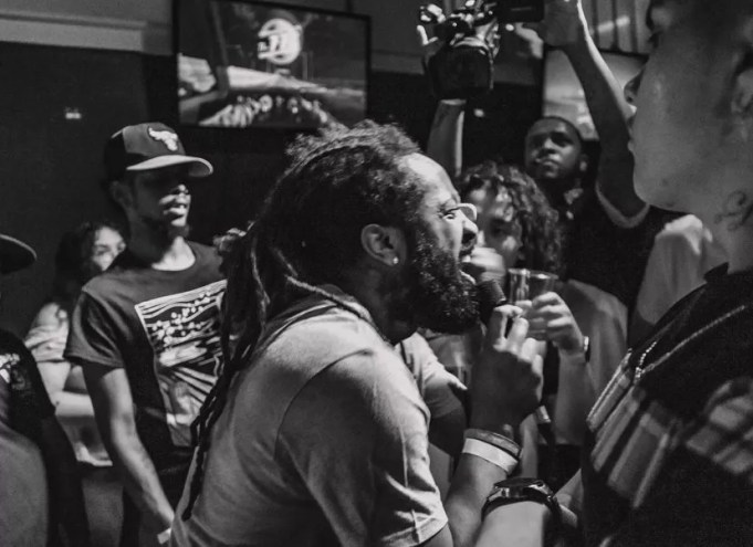 rapper at an open mic