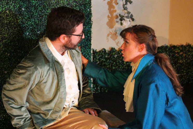 two people in colonial costumes