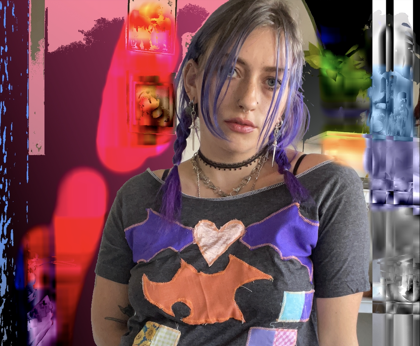 a woman with purple hair in braids wearing a choker and patchwork shirt