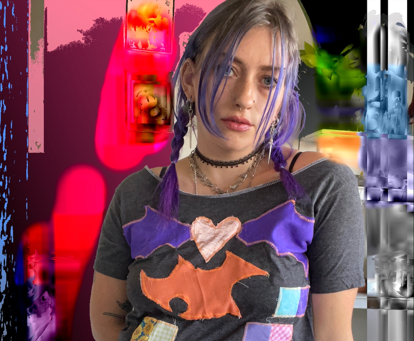 a woman with purple hair in braids wearing a choker and patchwork shirt