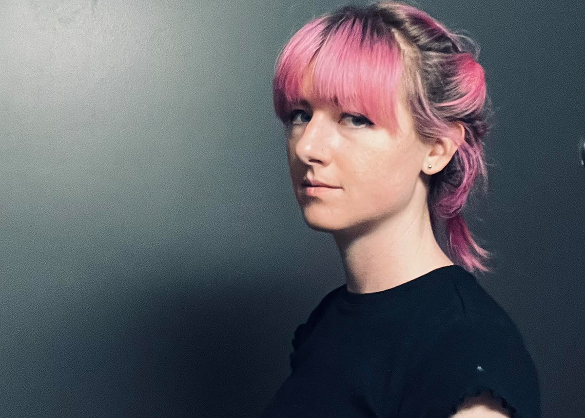 woman with short pink hair