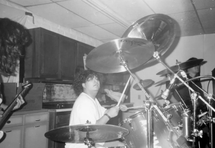 man playing drums
