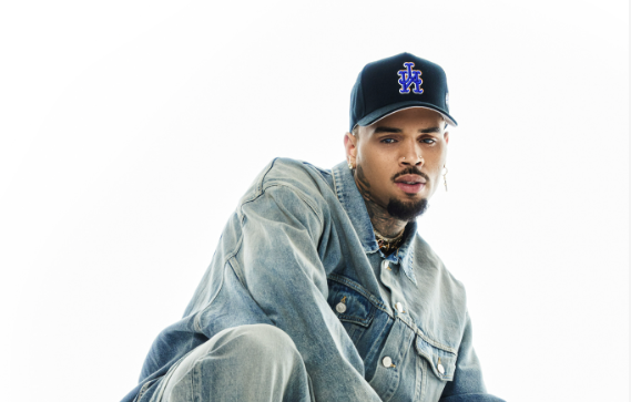 man wearing a hat and jean jacket