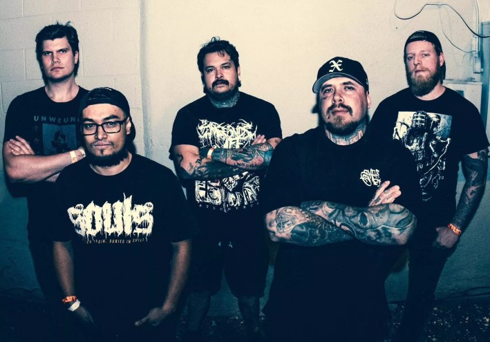 band poses for a photo