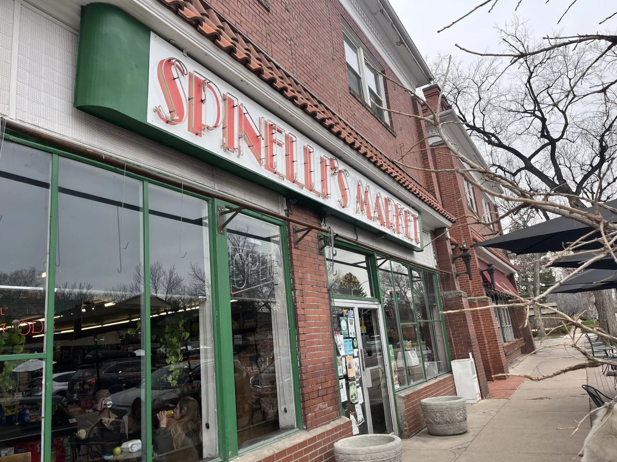 red and green sign on a storefront