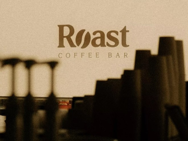 "roast coffee bar" logo behind pump bottles