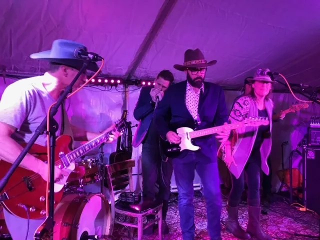 musicians playing on stage