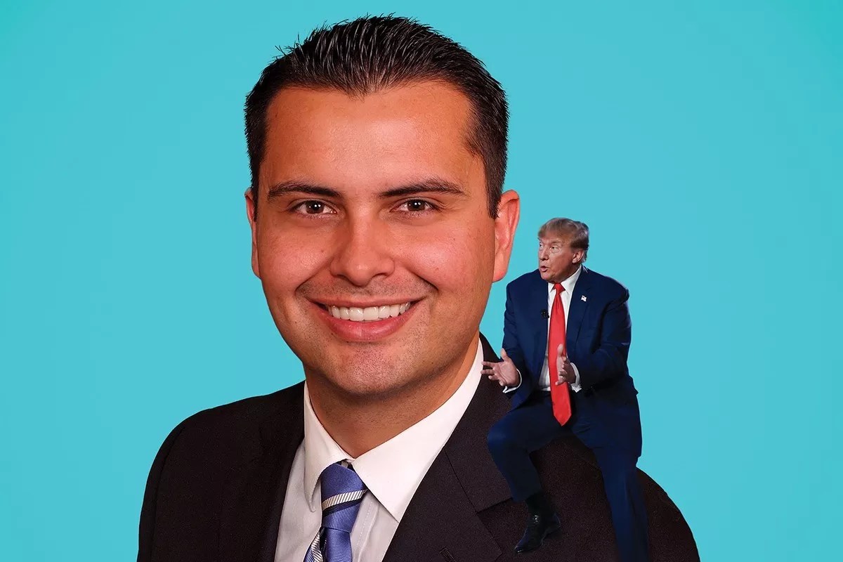 Colorado GOP Chair Dave Williams with former president Donald Trump on his shoulder.