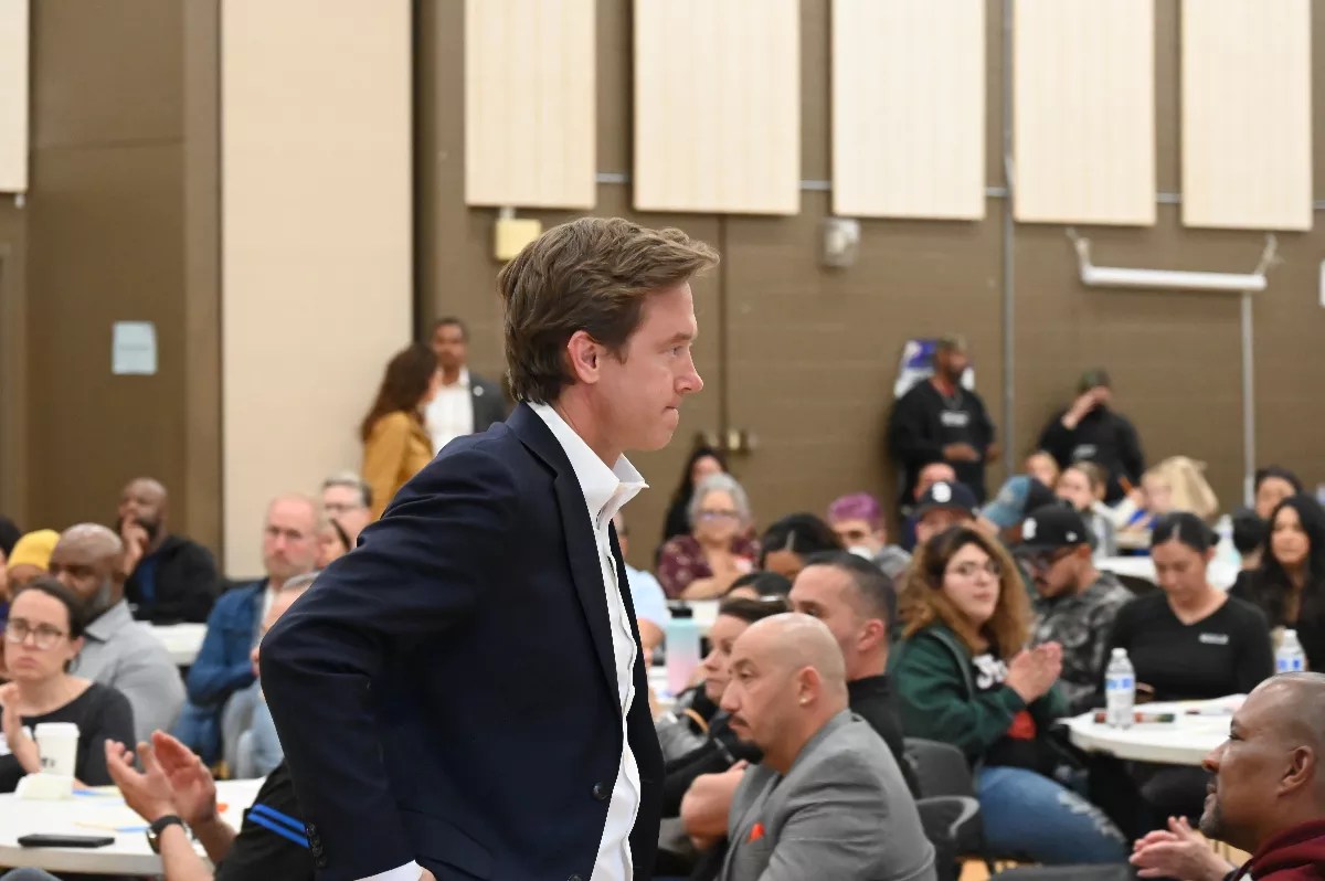 Mayor Mike Johnston talks to Denver residents.