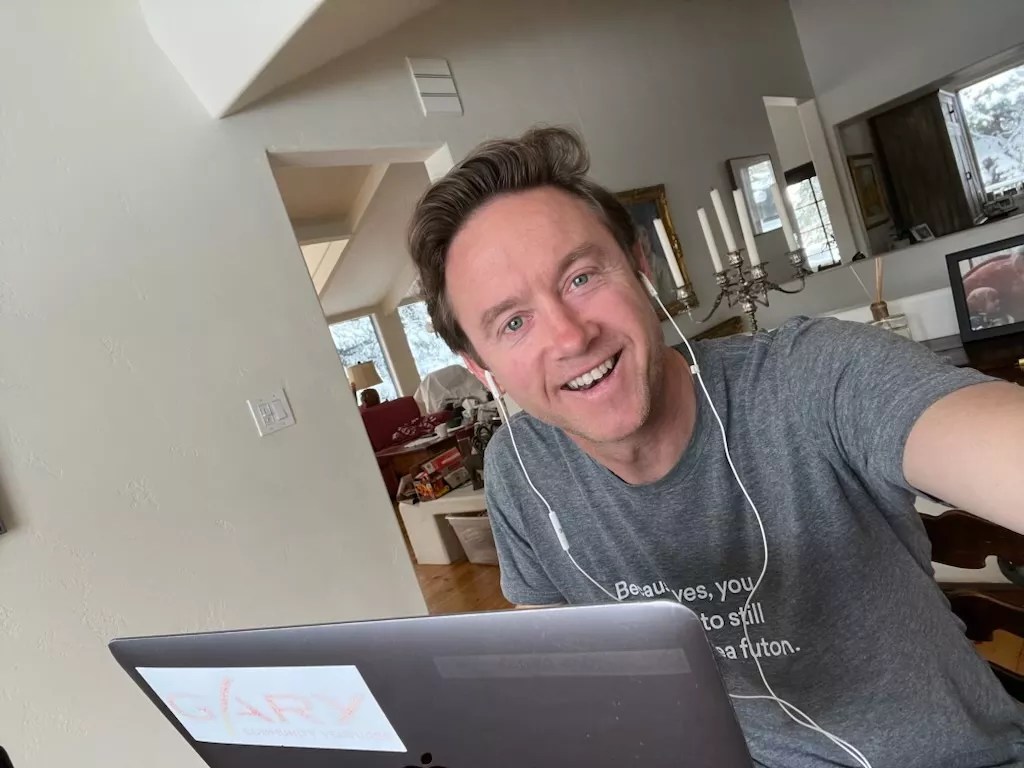 Denver Mayor Mike Johnston takes a selfie