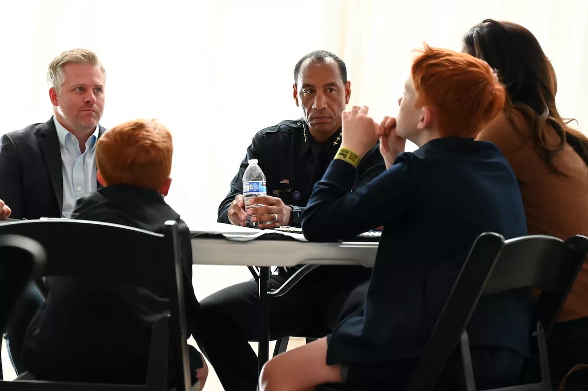 A family talks to the police chief.