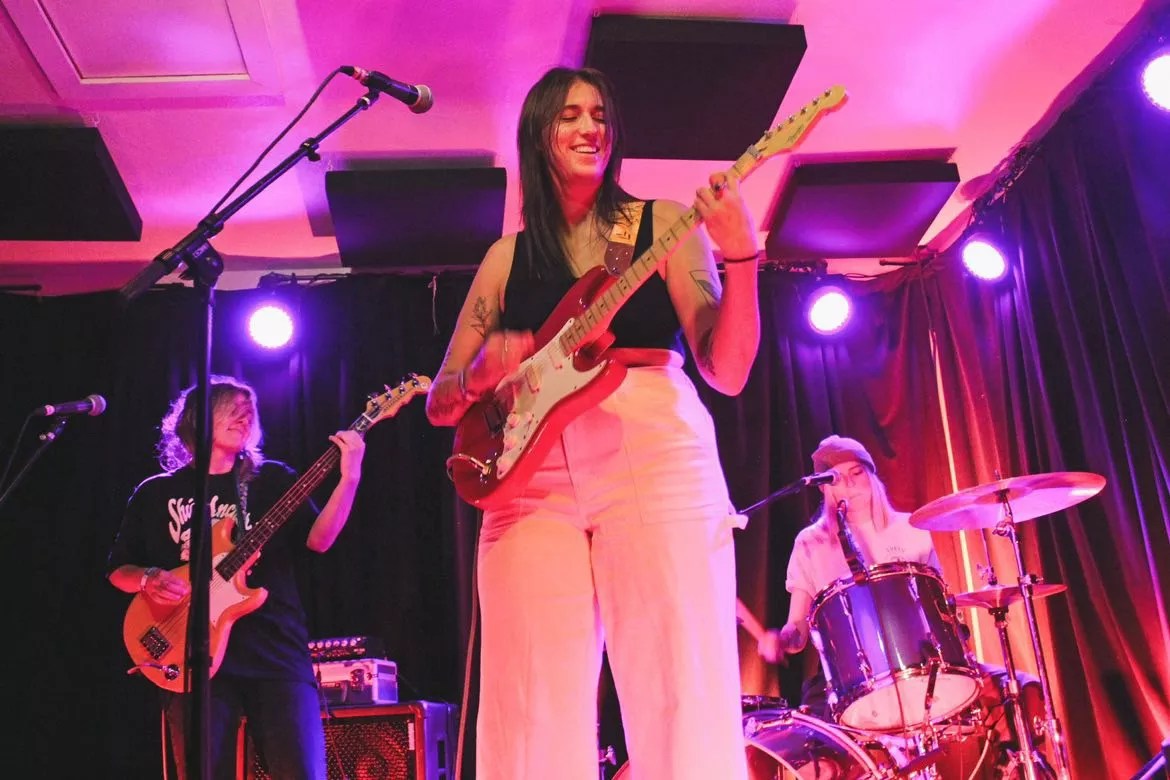 woman playing guitar