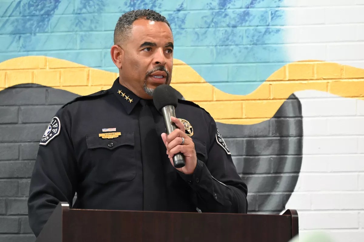 man in uniform at mike.