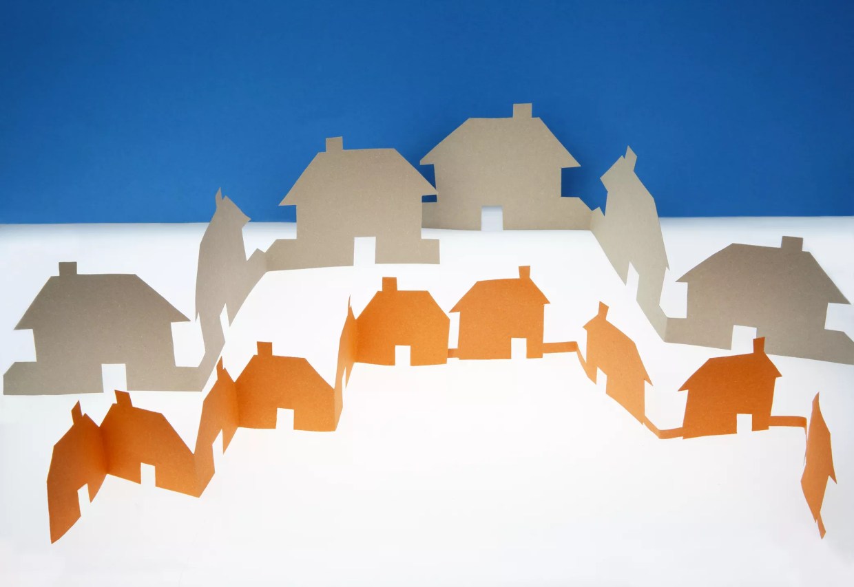 two rows of houses in paper silhouette