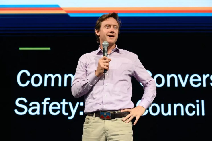 A man stands on stage.