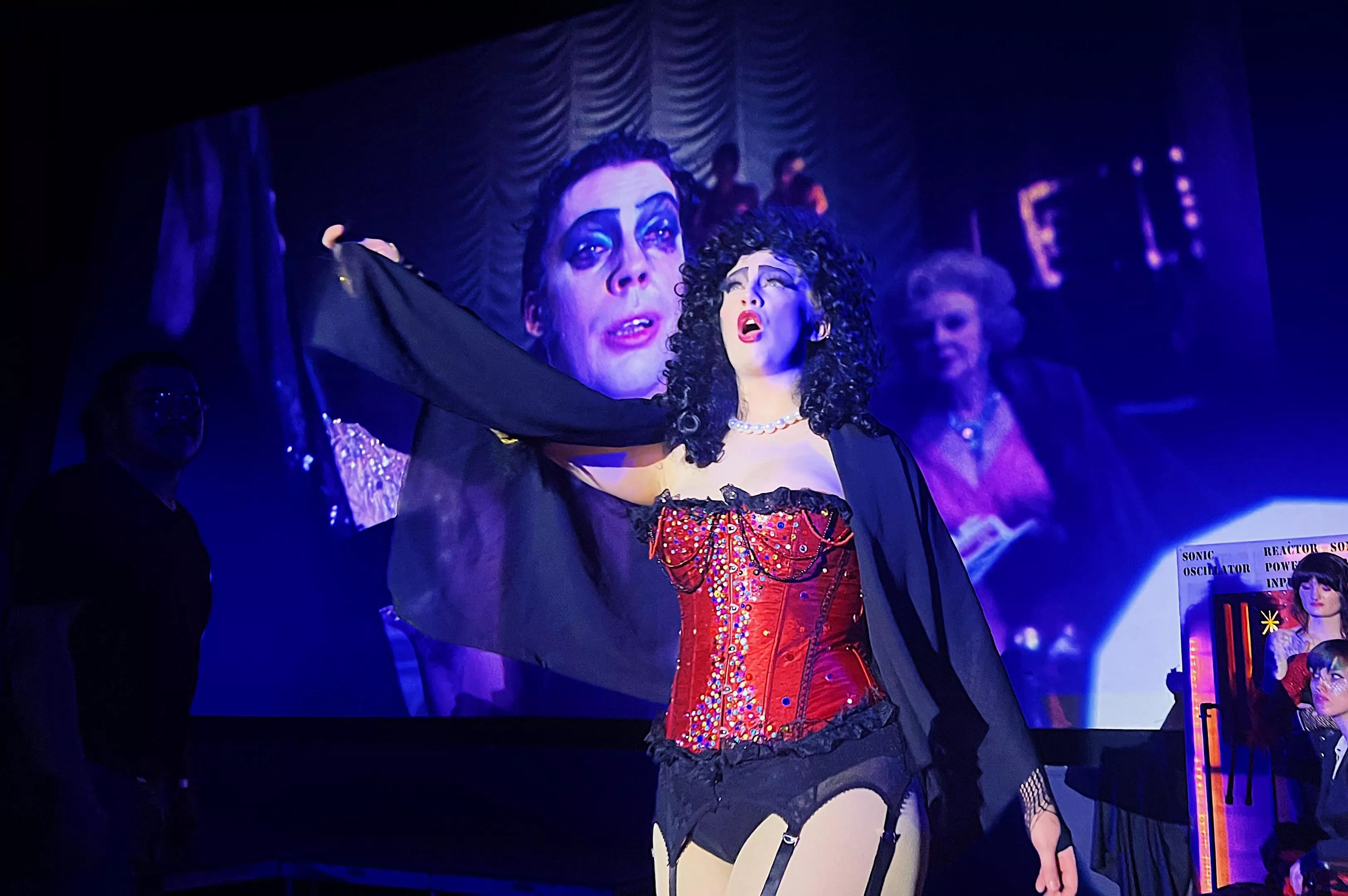Shadow cast members perform <i>The Rocky Horror Picture Show</i> at the Esquire Theatre.