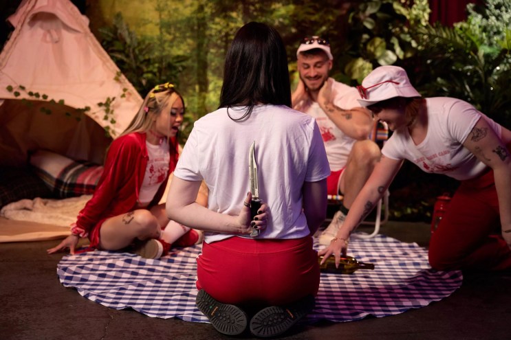 woman with a night behind her back