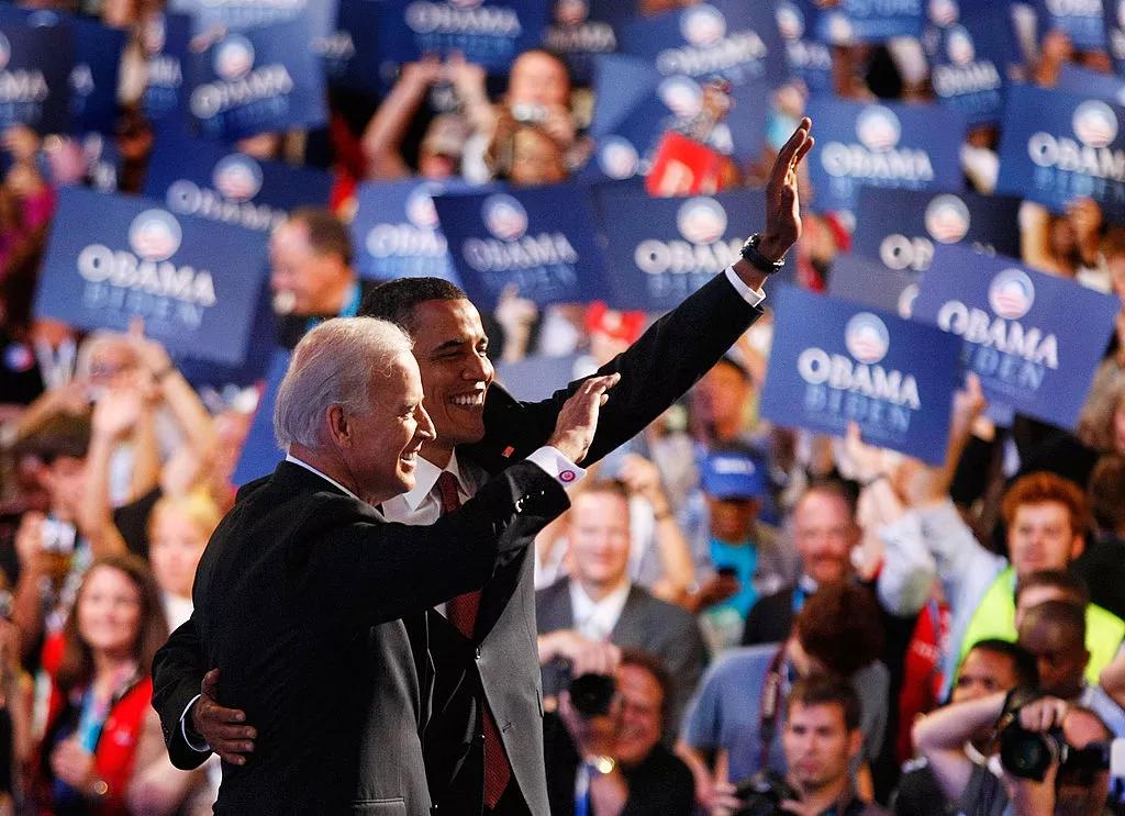 Barrack Obama and Joe Biden wave to crowd at 2008 DNC