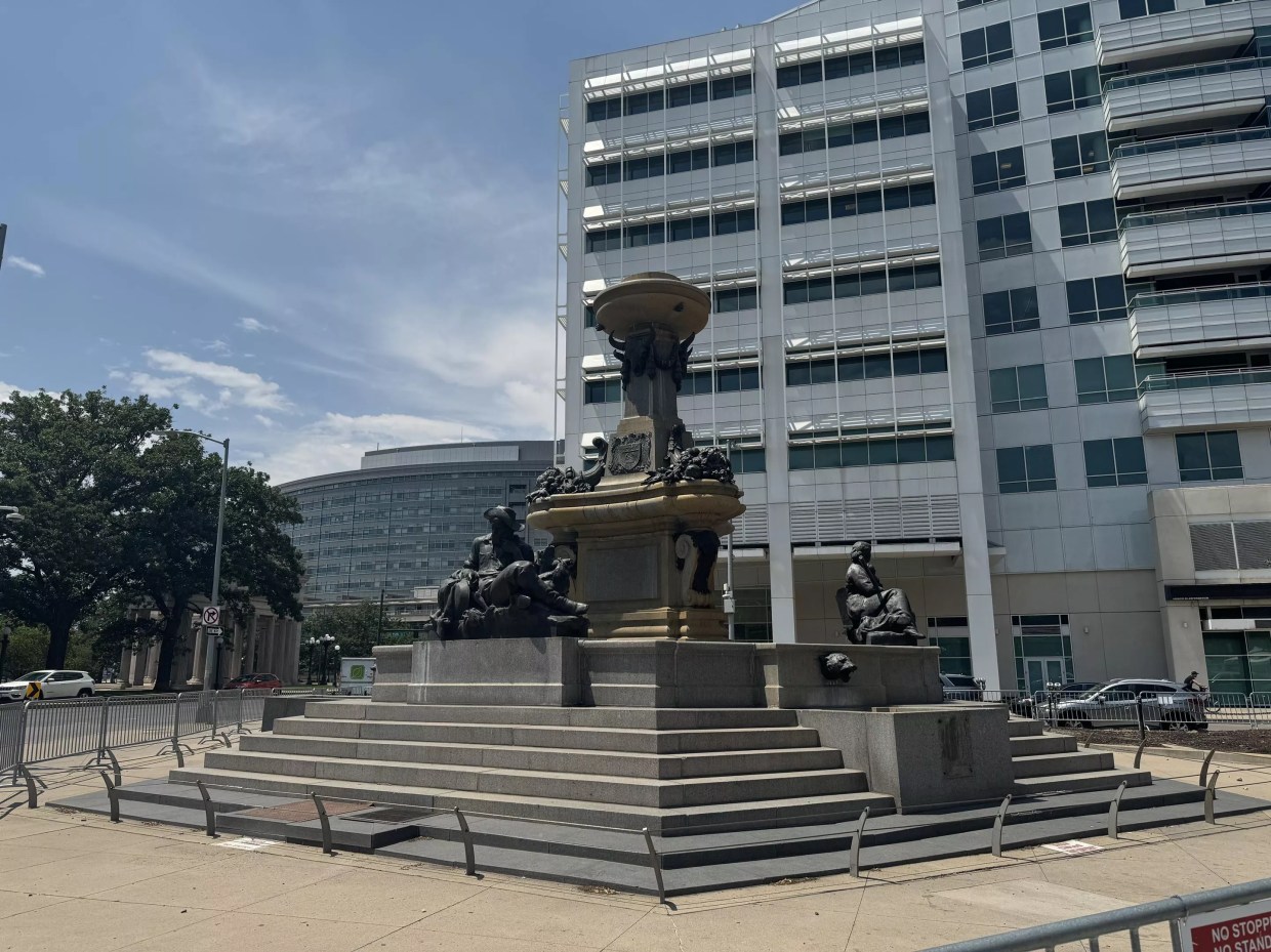 Broken fountain and statue downtown