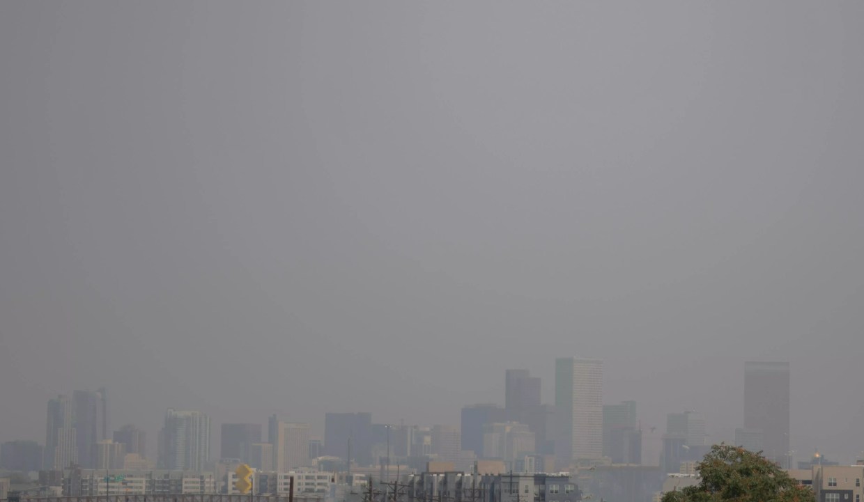 Hazy Denver skyline cover in smoke