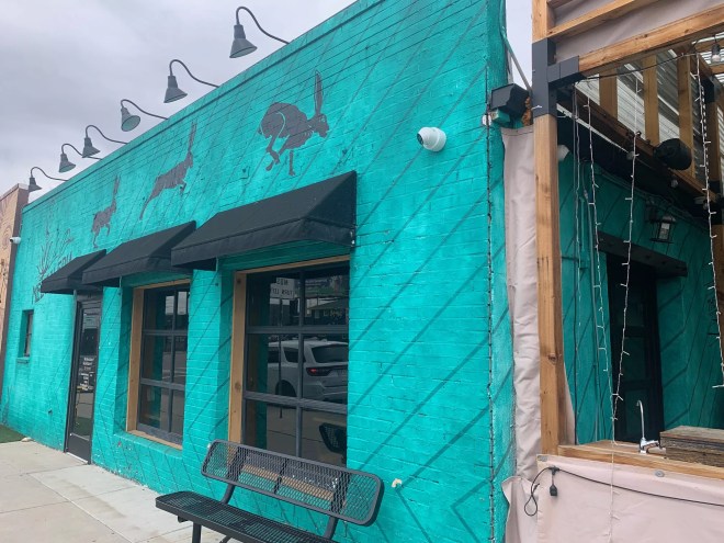 exterior of a teal building