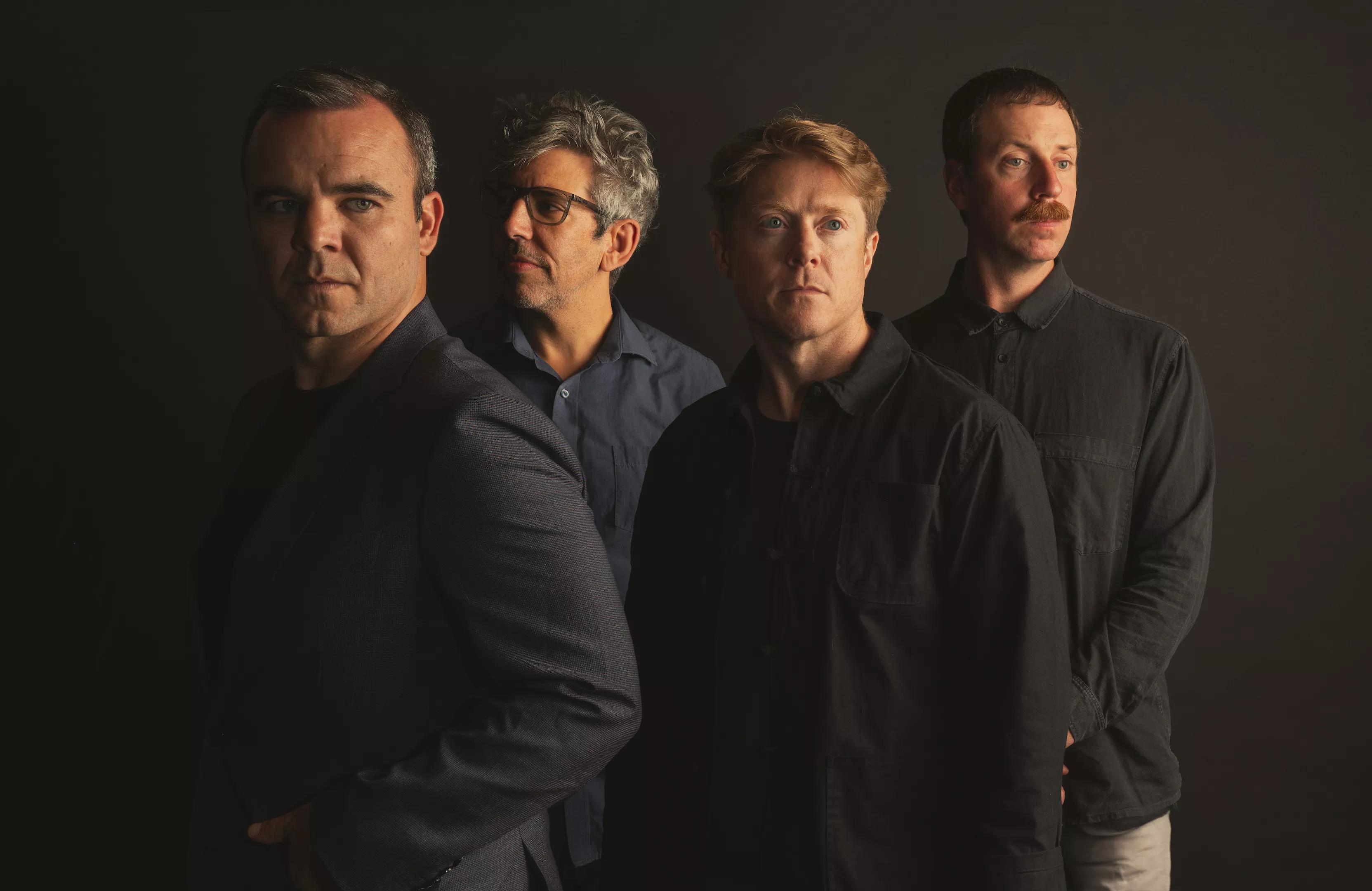 four members of band