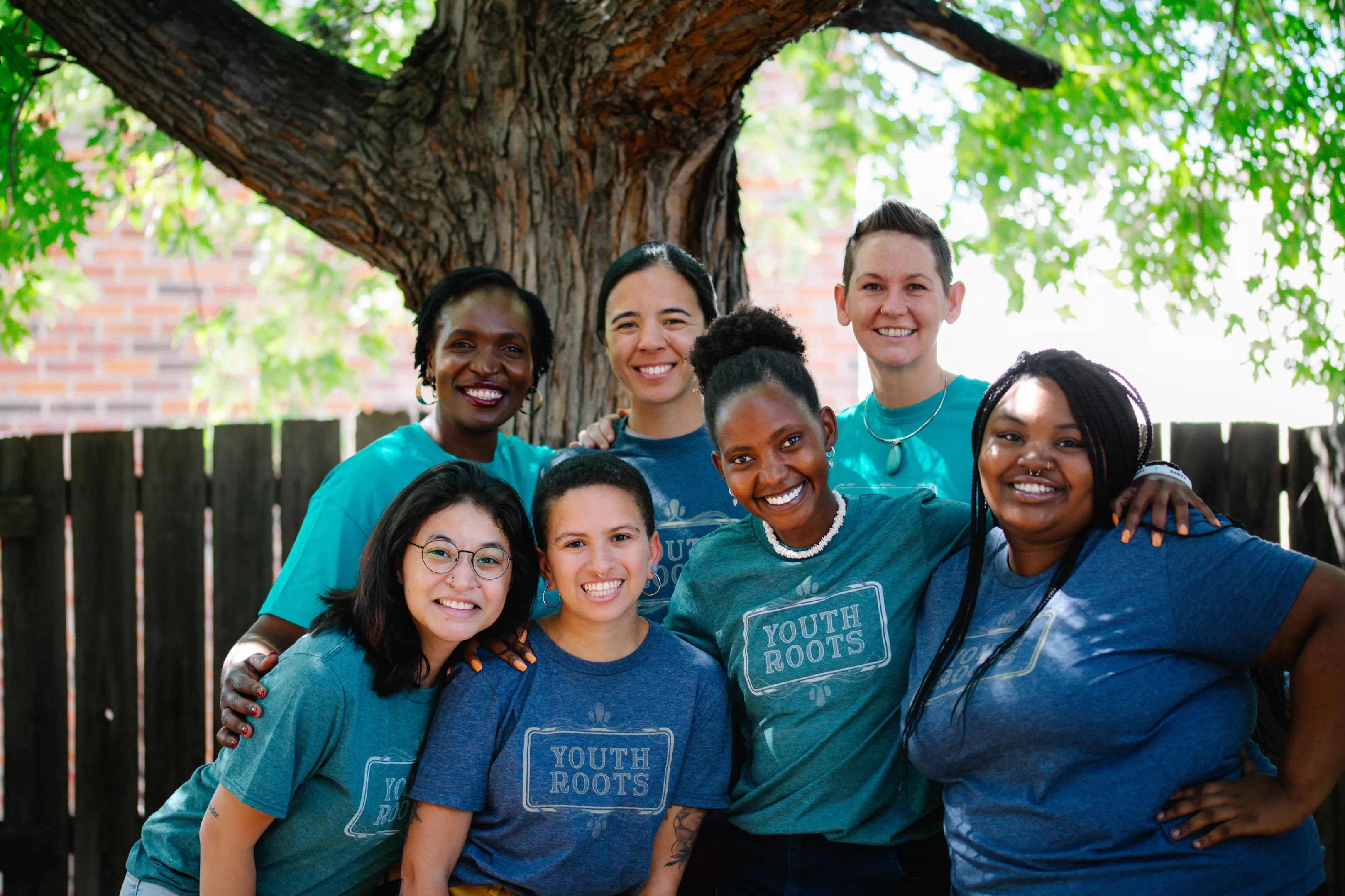 kids in blue and green shirts