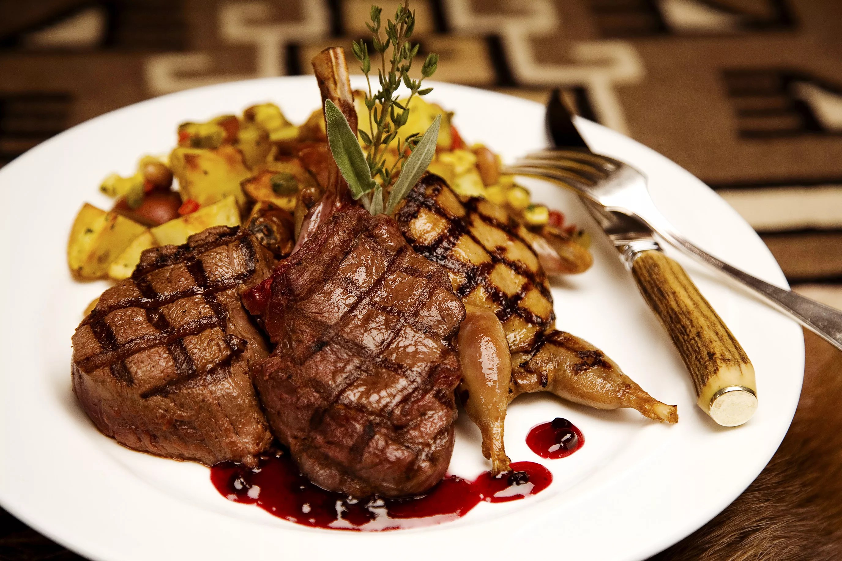 various grilled meats on a plate