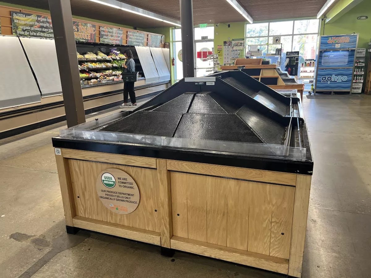 empty shelves at grocer store.