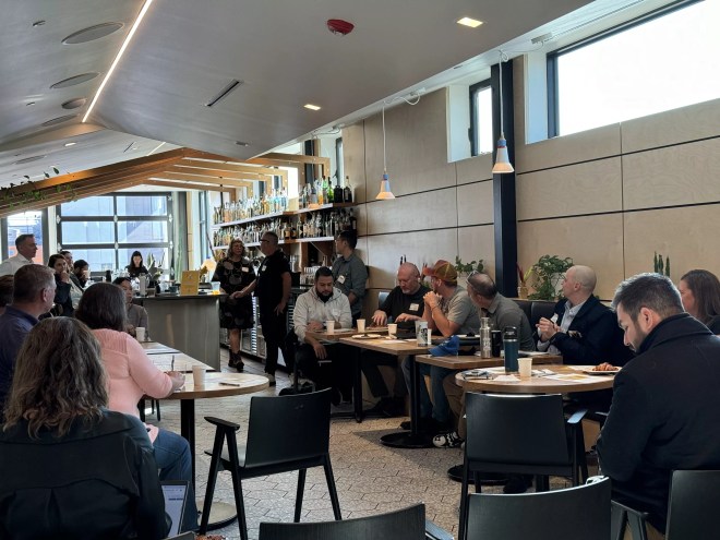 a group of people seated at tables