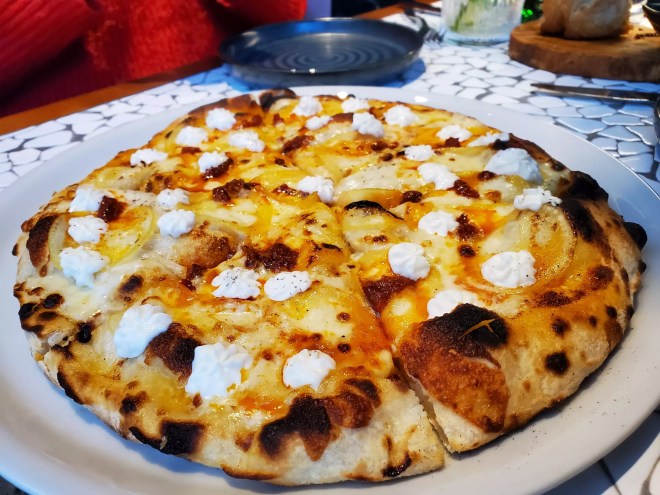 pizza topped with lemon and ricotta