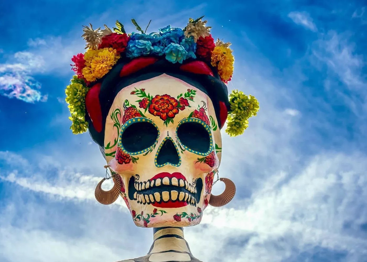 giant catrina against the sky