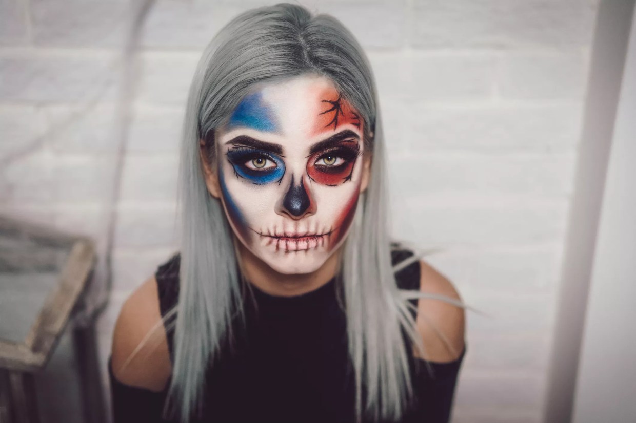 woman with painted face for halloween