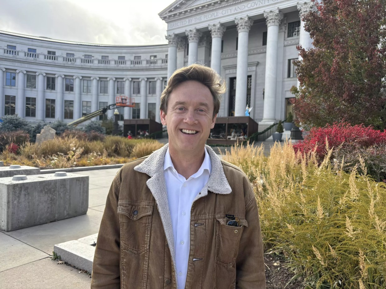 Mayor mike Johnson in front of Denver city hall
