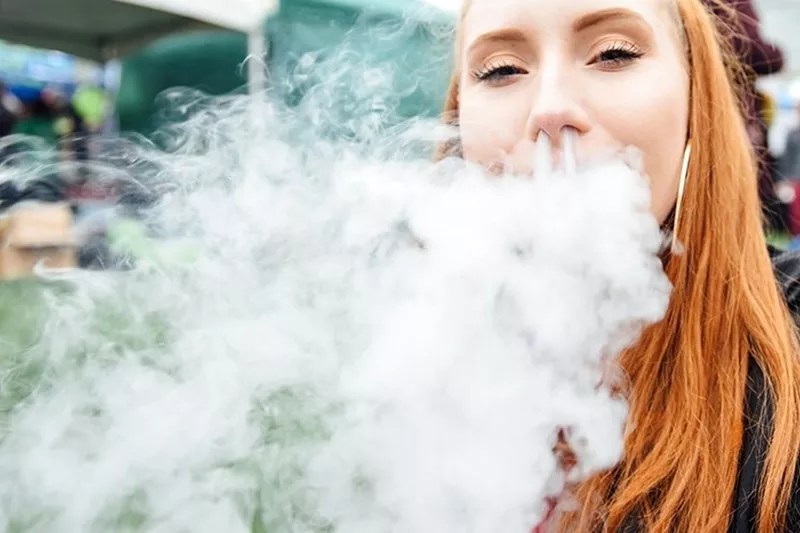 redheaded girl vaping