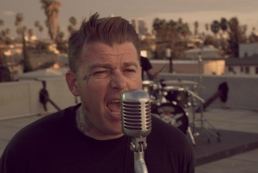 Brent Loveday of Reno Divorce singing into a microphone