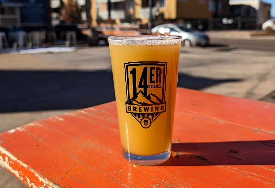 glass of beer on wood table