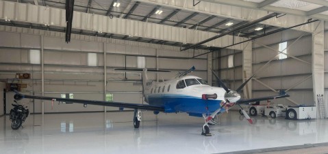 small plane in hangar