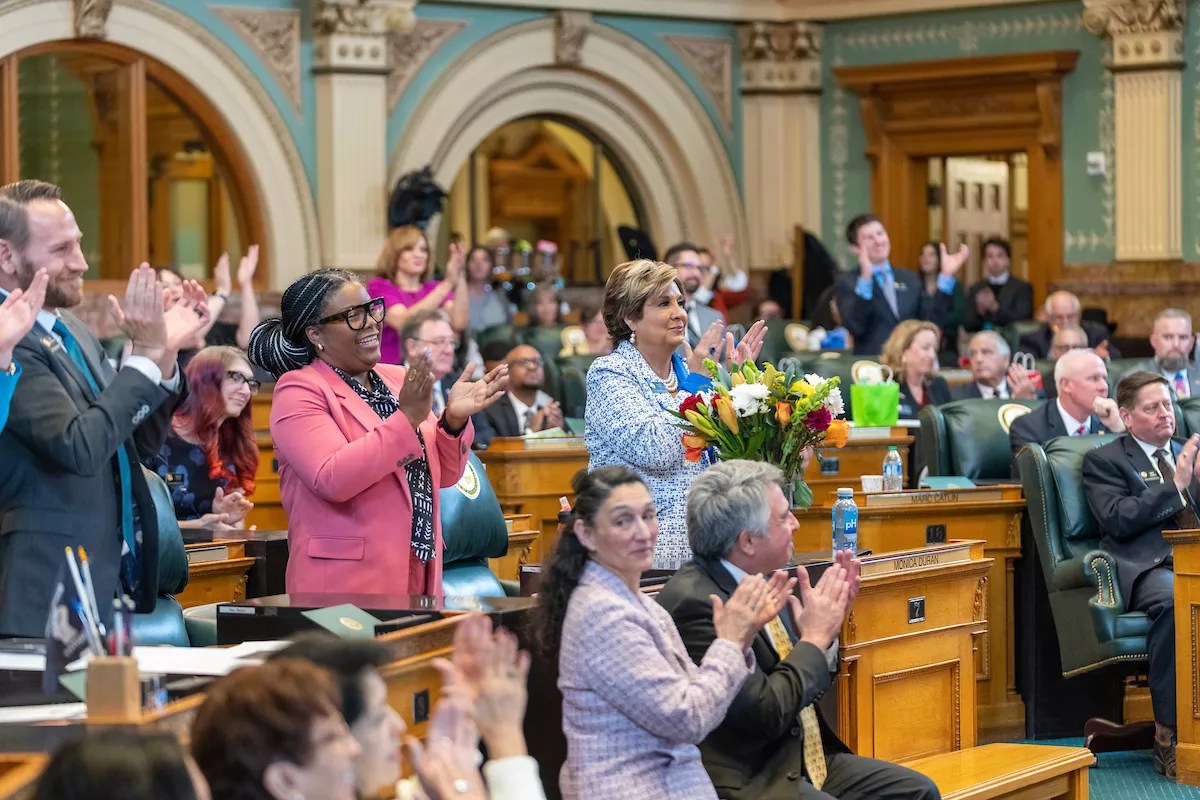 Assistant Majority Leader Jennifer Bacon (left) and Majority Leader Monica Duran (right) applaud the opening day of the 2023 legislative session.