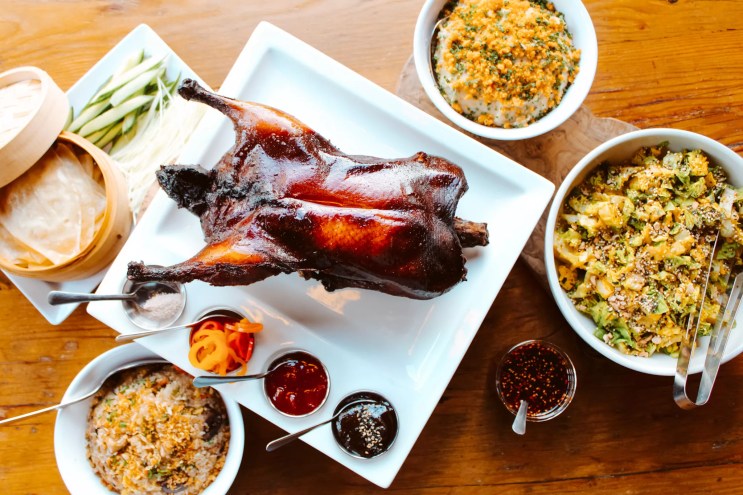 A whole Peking duck, wild mushroom fried rice and other sides from Ace Eat Serve