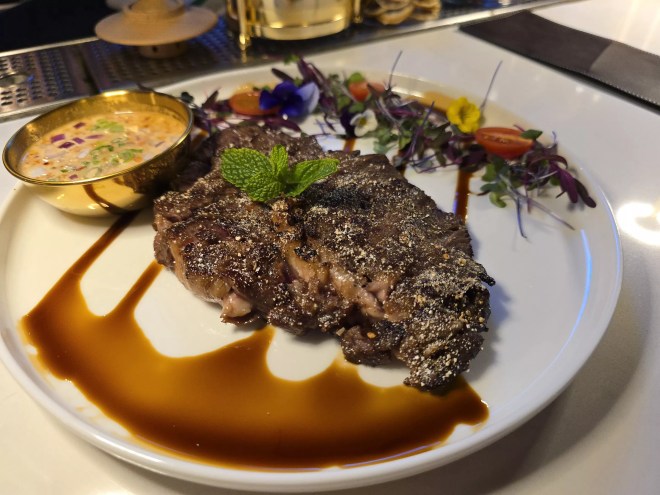 steak with sauce on a plate