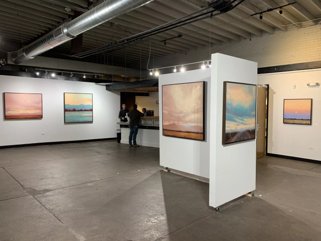 The interior of an art gallery on a slow day.