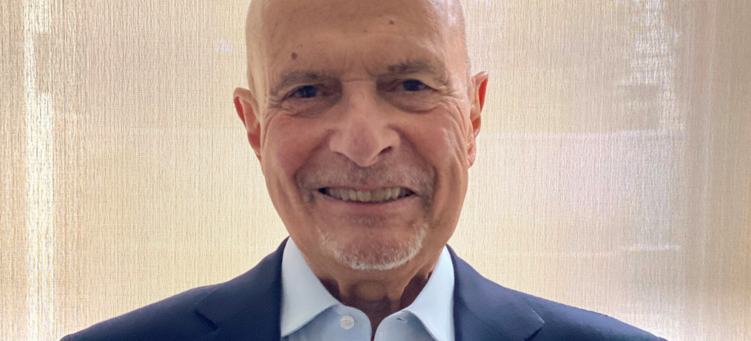 elderly man looking at camera.