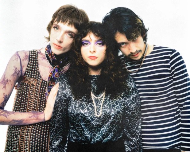 The three members of the Velveteers standing together