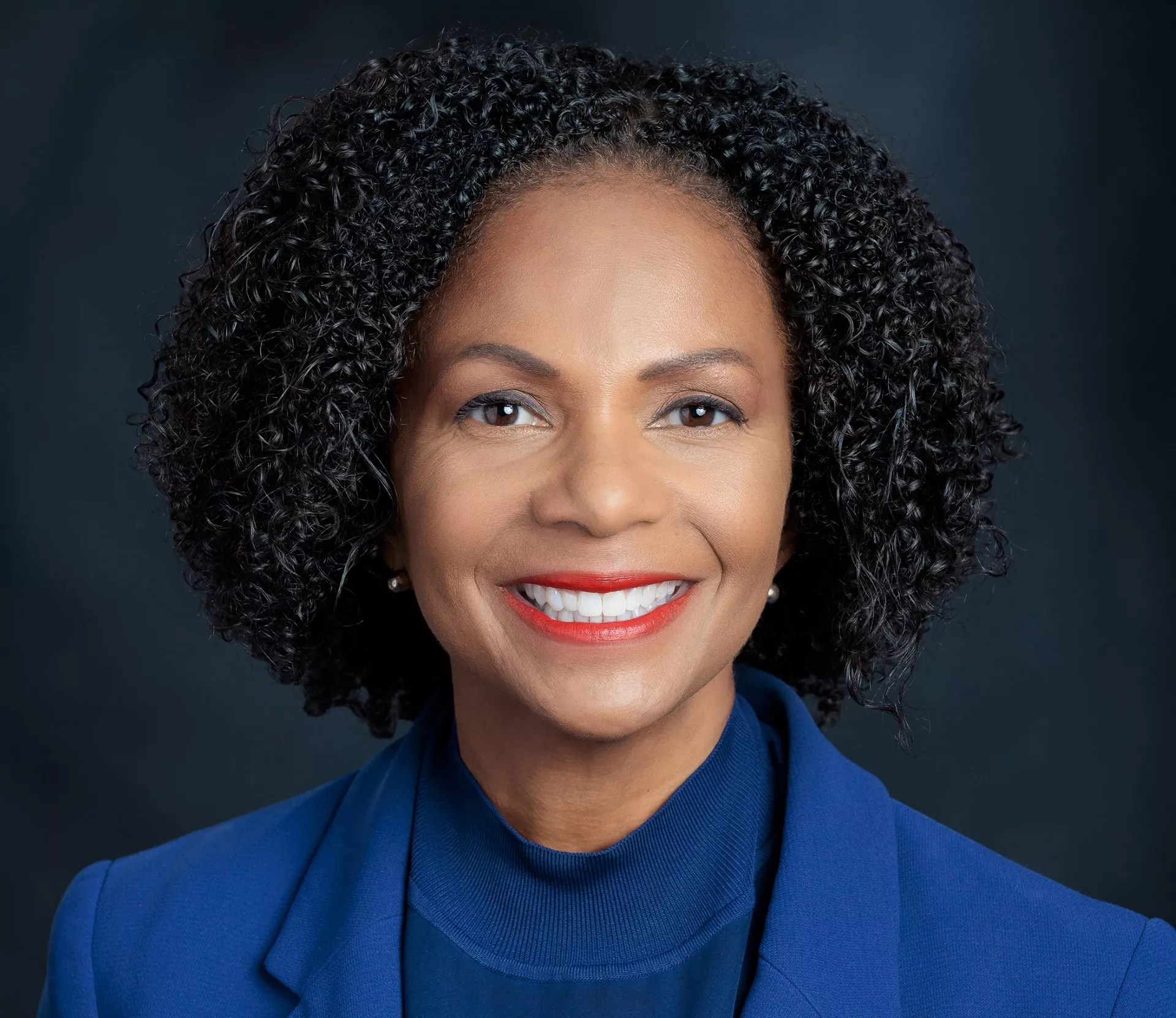 black woman in blue shirt