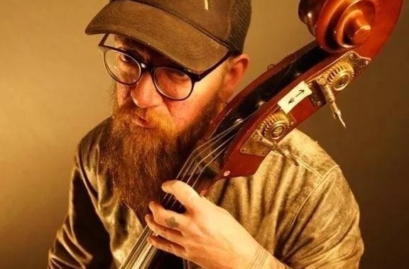 Geoff Robinson playing an upright bass