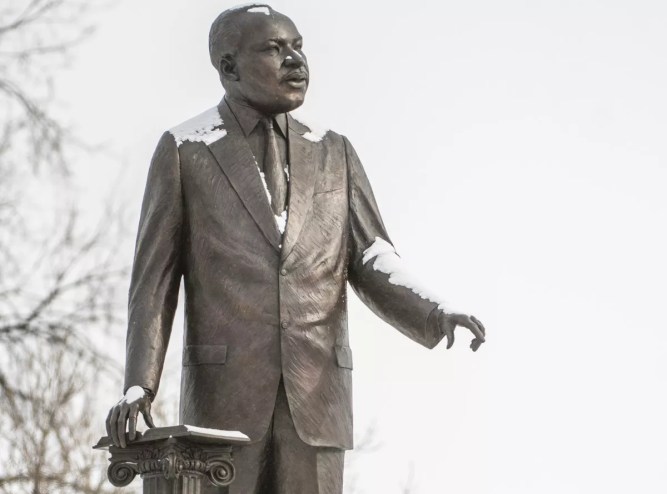 mlk statue with snow