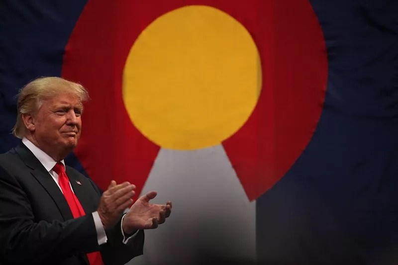 donald trump clapping by Colorado flag