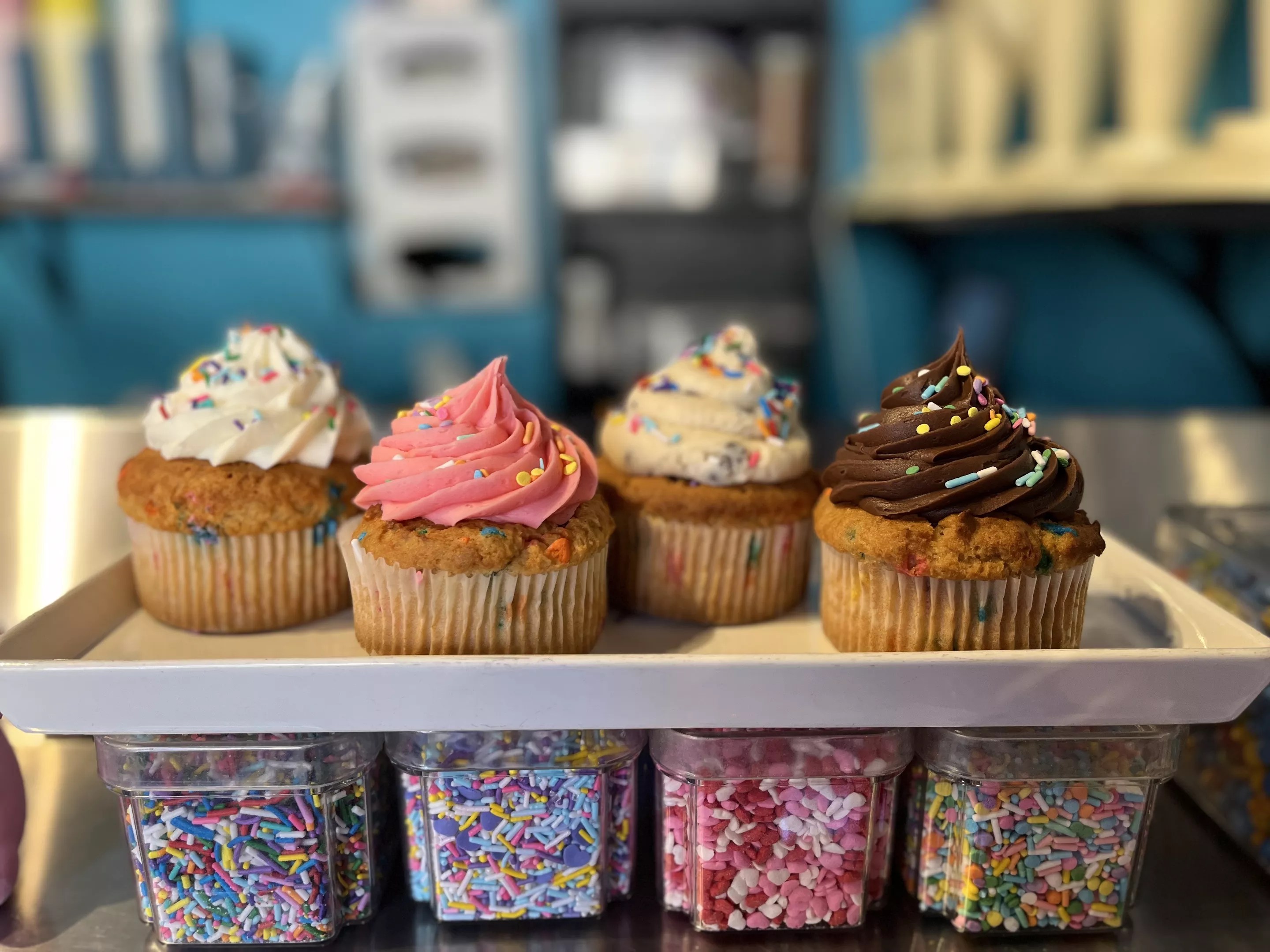 A shelf of cupcakes