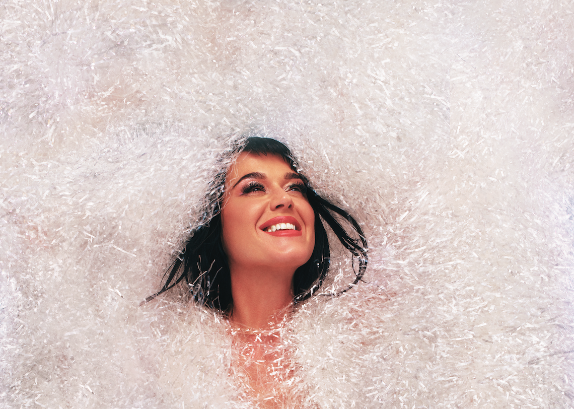 katie perry surrounded by bubbles.